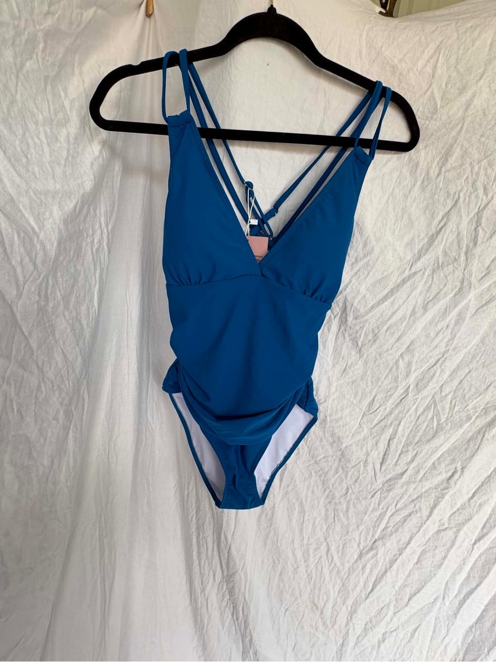Woman’s Deep Blue One-Piece Swimsuit with Strappy Back